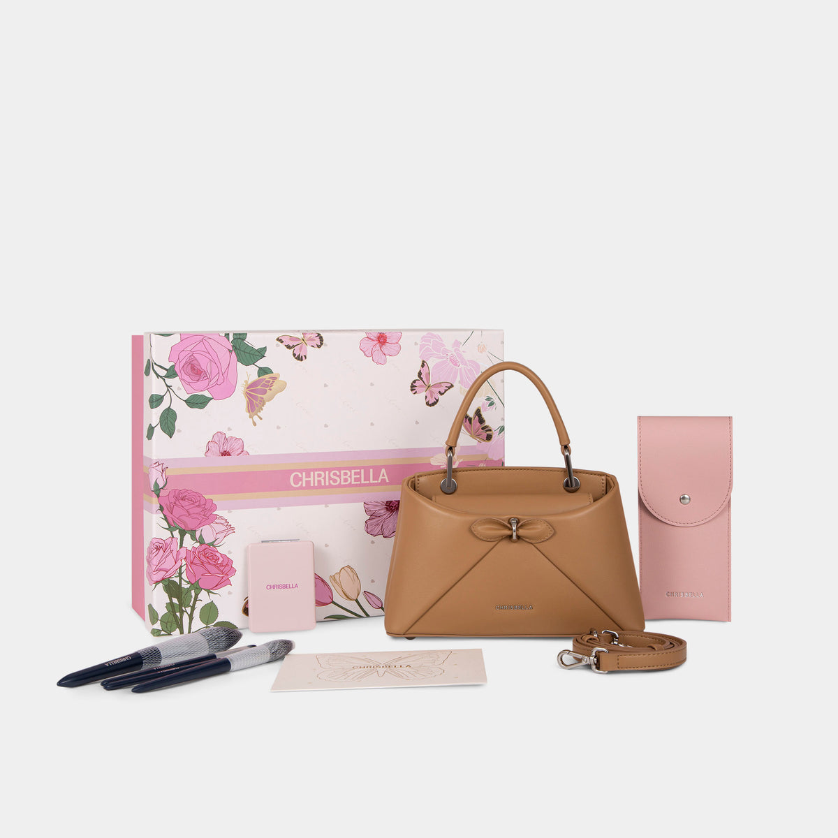 Sac à main avec nœud élégant et coffret cadeau fleuri