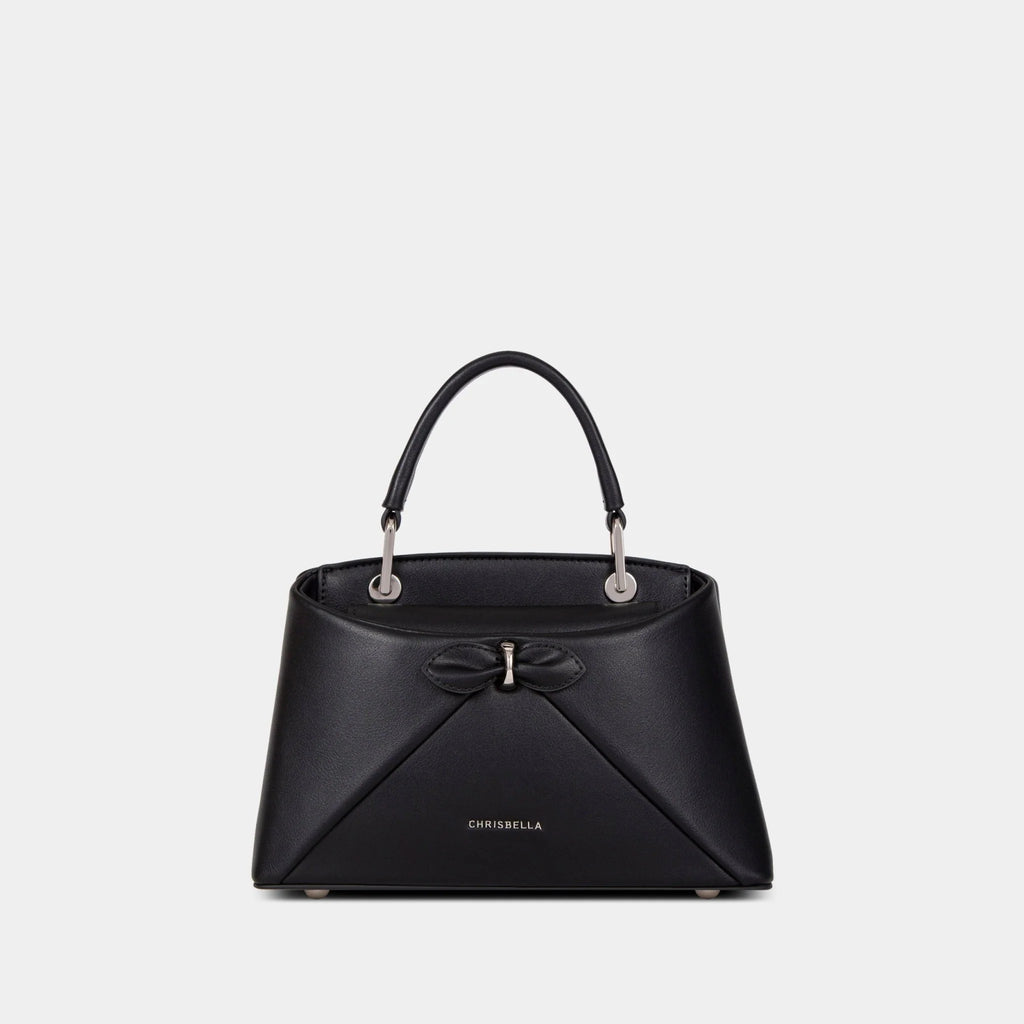 Sac à main avec nœud élégant et coffret cadeau fleuri