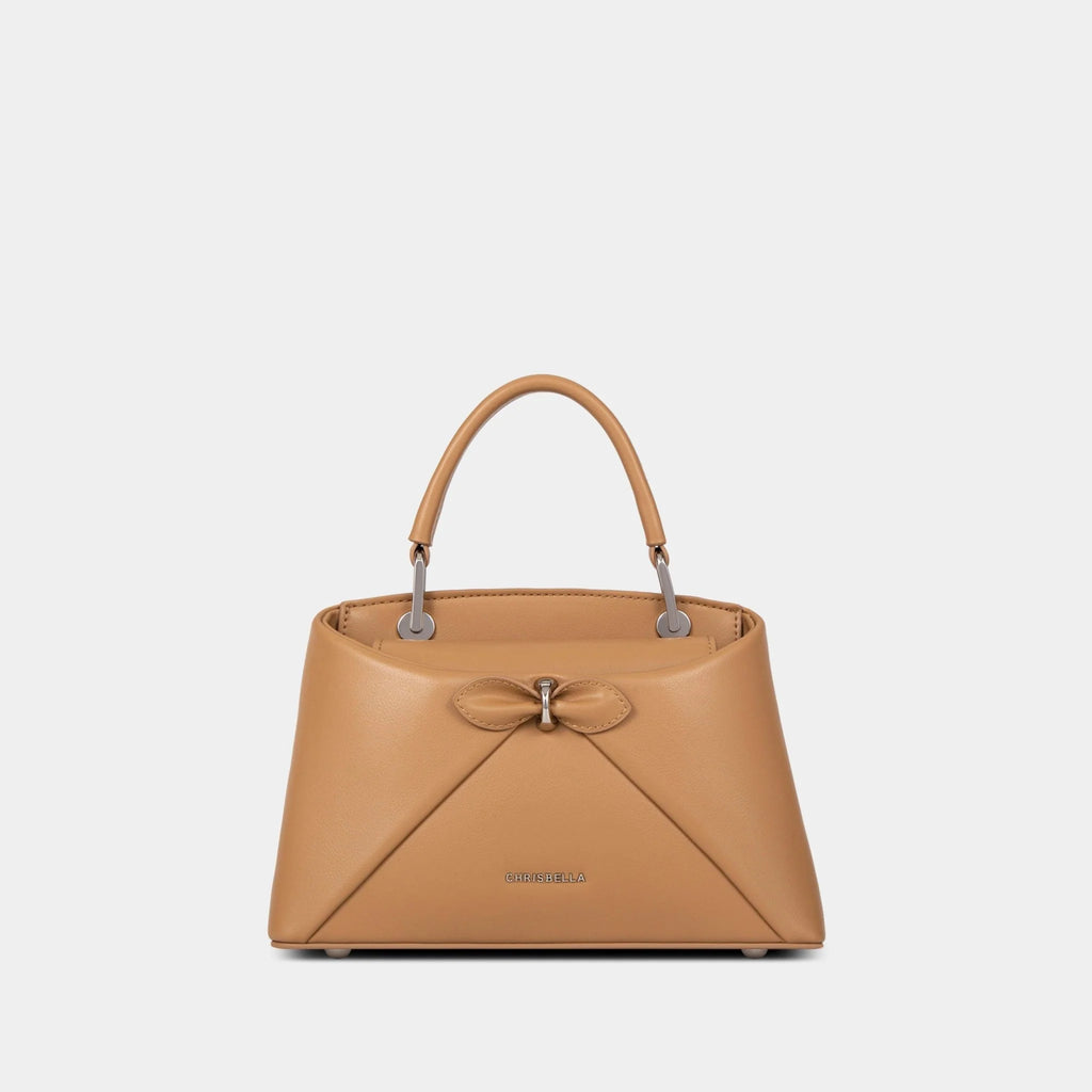 Sac à main avec nœud élégant et coffret cadeau fleuri
