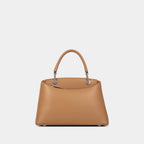Sac à main avec nœud élégant et coffret cadeau fleuri