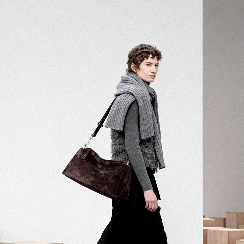 Chrisbella geometric handbag in use